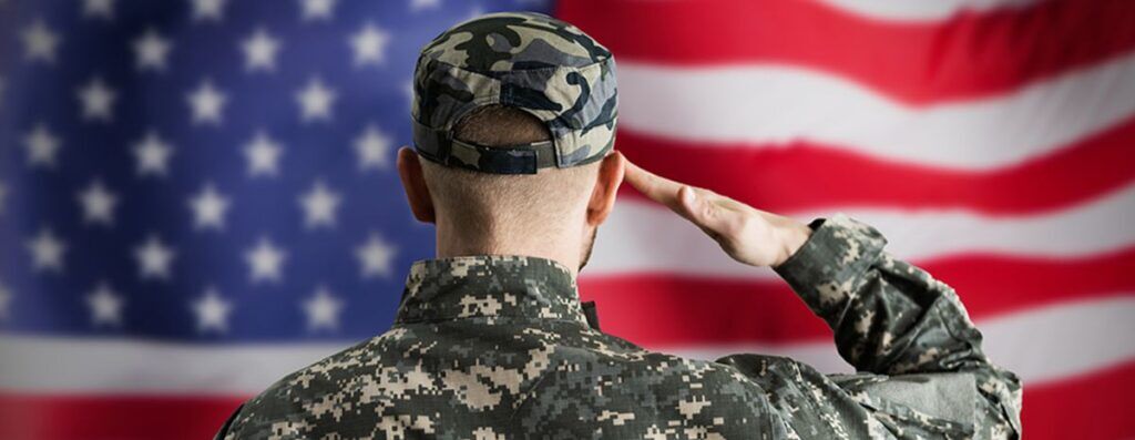 military veteran saluting us flag