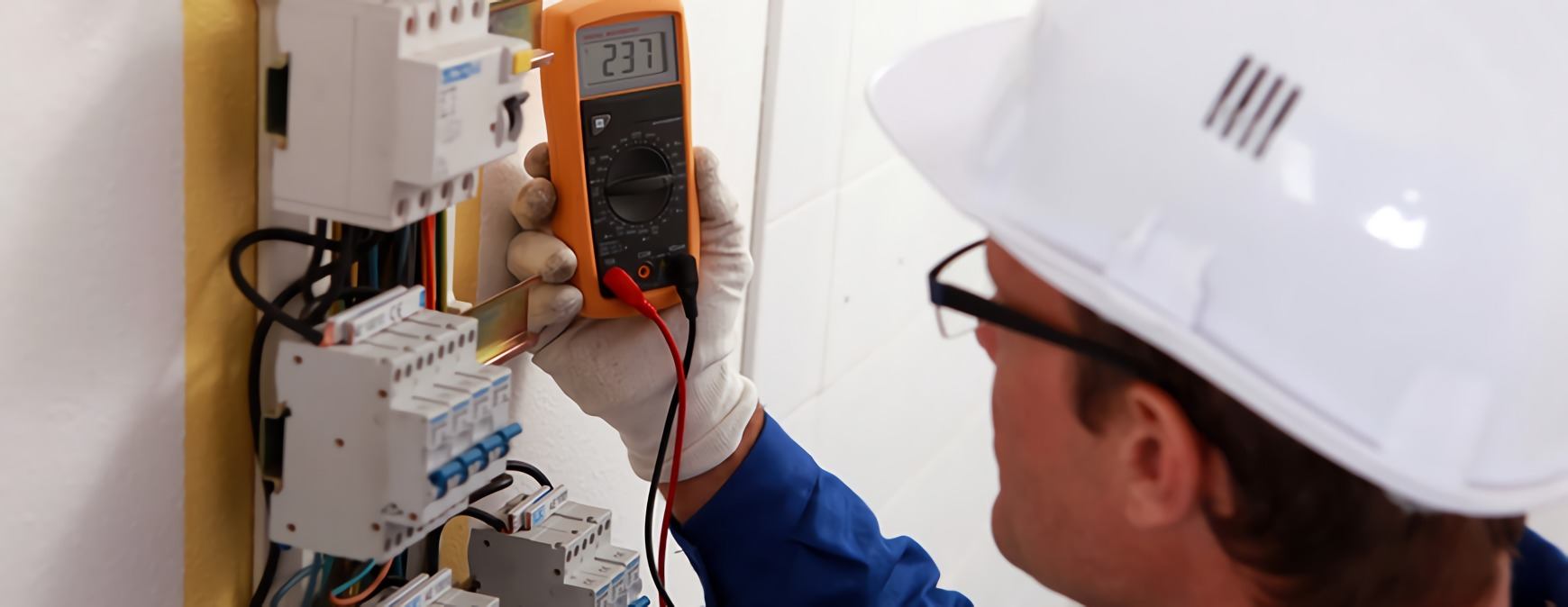 electrician using safety equipment