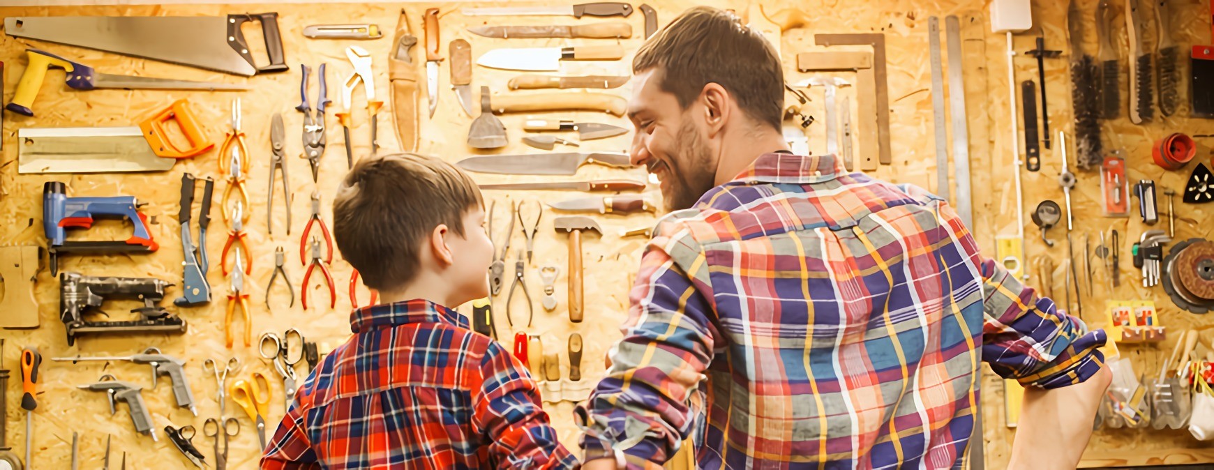 dad and son in workshop