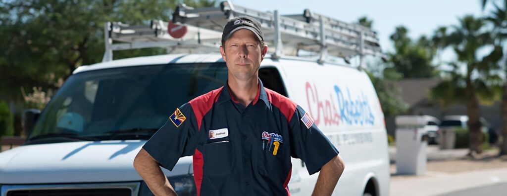 hvac business owner in front of van