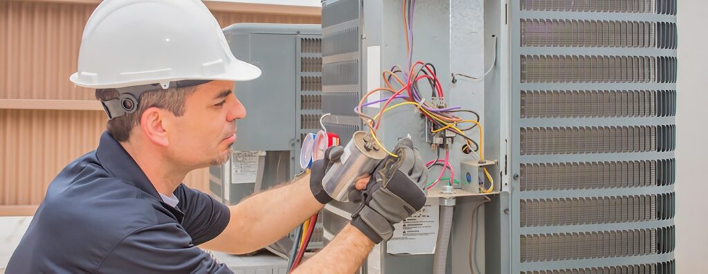 hvac technician using safety gloves